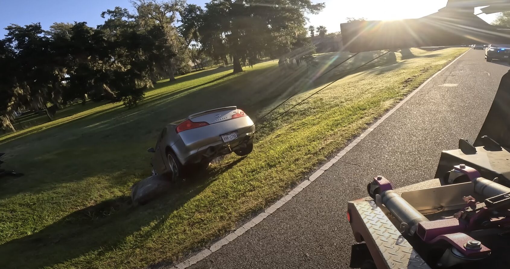 Safe roadside assistance and professional towing in Elmhurst IL neighborhoods Vehicle breakdown on quiet residential road awaiting professional towing assistance